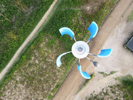 lantern with windmill turbine top view, renewable energy conceptの写真素材