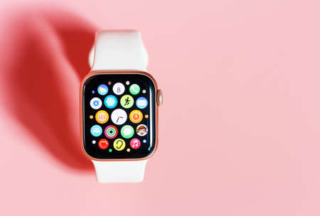 Seoul - 02.21.2021: Apple Watch on a pink background close up, copy spaceのeditorial素材