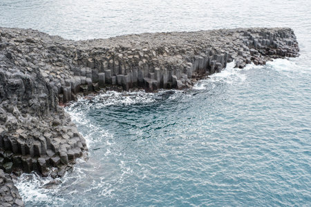 Rocky coast and sea, famous Jungmun Daepo site in Jeju island.