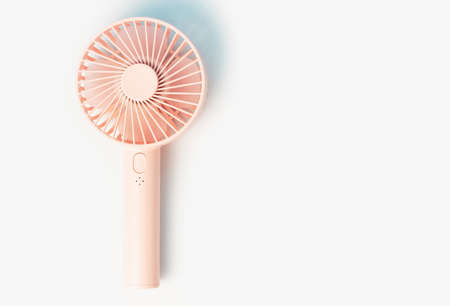 Small portable fan on white background close up, copy space.の写真素材