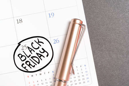 Inscription Black Friday on calendar 2022 close-up on backgroundの写真素材