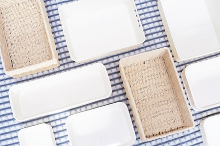 A plastic boxes of different sizes for storing clothes, organizing space, top view.の写真素材