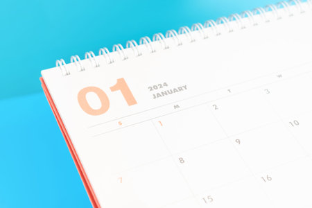 January 2024 calendar close-up on blue background, planning concept.の写真素材