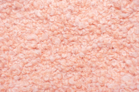 Pink faux fur surface close-up, texture and background.の写真素材