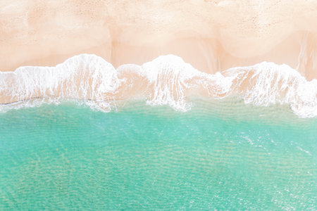 Blue ocean waves and beach aerial view, natural background.の写真素材