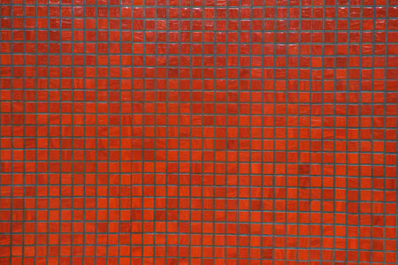 Red vintage ceramic tile to decorate the kitchen or bathroom.の写真素材