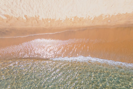 Ocean waves and beach aerial view, natural background.の写真素材