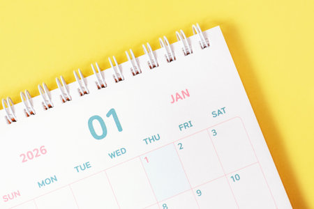 January 2026 calendar close-up on yellow background, planning concept.の写真素材
