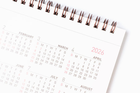 Paper calendar for 2026 on white background close-up top view.