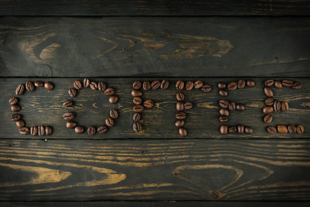coffee beans concept on black woodの写真素材