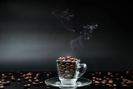 Hot coffee bean in coffee cupの写真素材