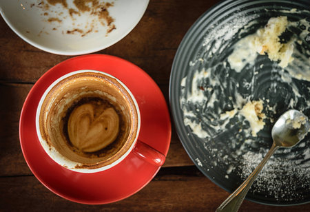 coffee depleted on table wood in cafe shopの写真素材