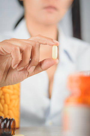 close up royal jelly on hand,supplementの写真素材