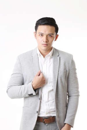 Portrait of Asian Man With Gesture Signの写真素材