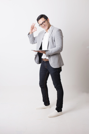 Portrait of Asian Man  With Gesture Signの写真素材