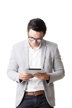 Portrait of Asian Man With a tabletの写真素材