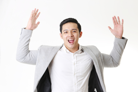 Portrait of Asian Man in Isolated Backgroundの写真素材