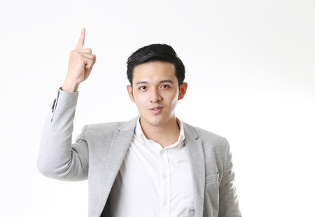 Portrait of Asian Man in Isolated Backgroundの写真素材