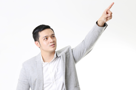 Portrait of Asian Man in Isolated Backgroundの写真素材