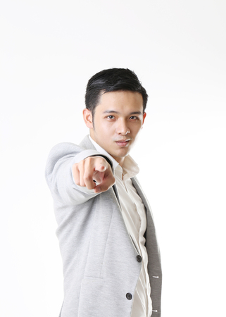 Portrait of Asian Man in Isolated Backgroundの写真素材