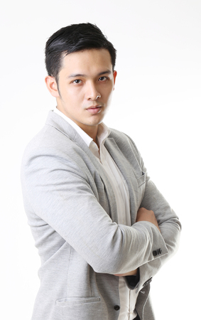 Portrait of Asian Man in Isolated Backgroundの写真素材