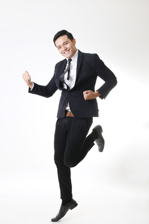 Portrait of Asian Man in Isolated Backgroundの写真素材