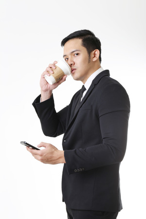 Portrait of Asian Man in Isolated Backgroundの写真素材