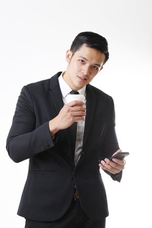 Portrait of Asian Man in Isolated Backgroundの写真素材