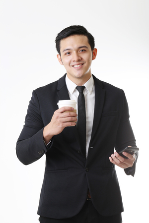 Portrait of Asian Man in Isolated Backgroundの写真素材