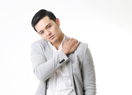 Portrait of Asian Man in Isolated Backgroundの写真素材