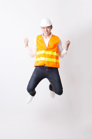 Portrait of Asian Engineer or Architect Designer in Isolated Background With Gesture Signの写真素材