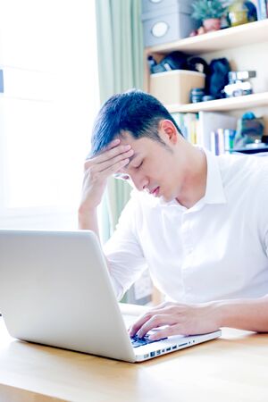 Portrait of Asian Man Isolated With Gesture Signの写真素材