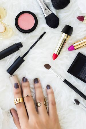 Fashion make up products in a white fur textureの写真素材