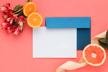 Citrus wedding invitation in coral background
