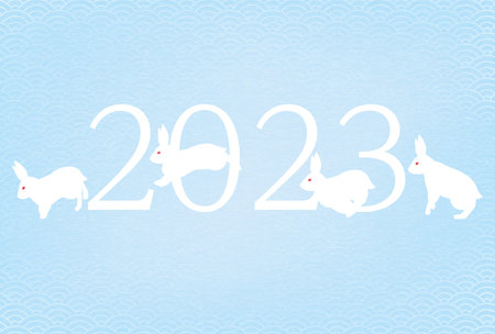 Nengajo for the Year of the Rabbit 2023, Japanese pattern background with the letters 2023, running and jumping rabbits and blue sea waves
