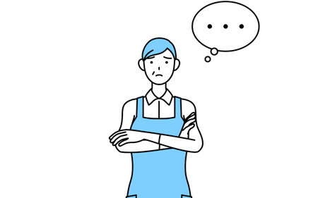 A senior woman in an apron, arms crossed, thinking.のイラスト素材
