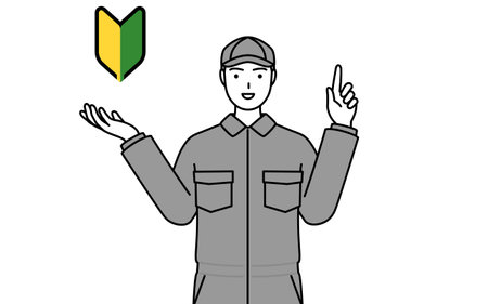 A mechanic in coveralls showing the symbol for young leaves, Vector Illustrationのイラスト素材