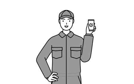 A mechanic in coveralls using a smartphone at work, Vector Illustrationのイラスト素材