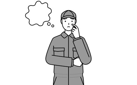 A mechanic in coveralls thinking while scratching his face, Vector Illustrationのイラスト素材