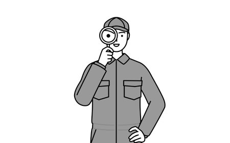 A mechanic in coveralls holding a magnifying glass and placing his hand on his hip, Vector Illustrationのイラスト素材