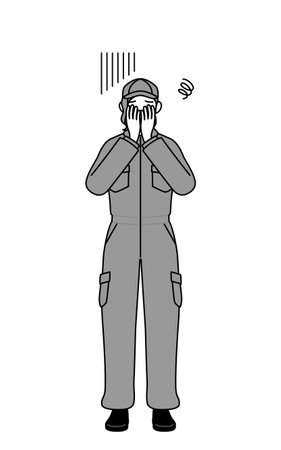A mechanic woman in coveralls covering her face in depression, Vector Illustrationのイラスト素材
