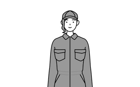 A mechanic woman in coveralls with a smile facing forward, Vector Illustrationのイラスト素材
