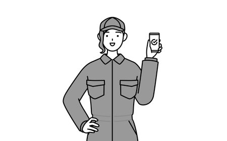 A mechanic woman in coveralls using a smartphone at work, Vector Illustrationのイラスト素材
