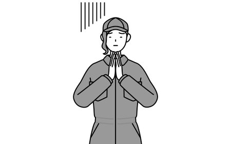 A mechanic woman in coveralls apologizing with her hands in front of her body, Vector Illustrationのイラスト素材