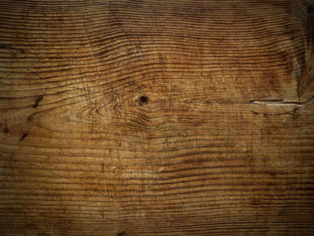 old scratched wooden oak board with cracks backgroundの写真素材