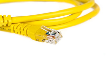 Yellow network cable isolated on white background