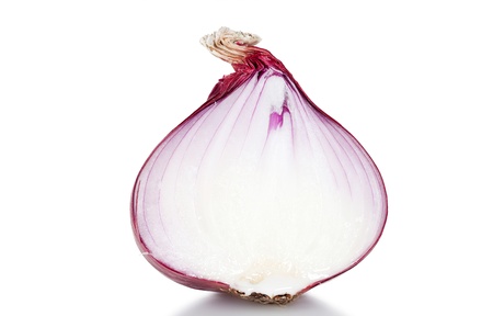 Macro shot of a halved red onion isolated against a white backgroundの写真素材