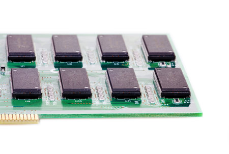 Digital circuit board with microchips in Sockets isolated on White Background