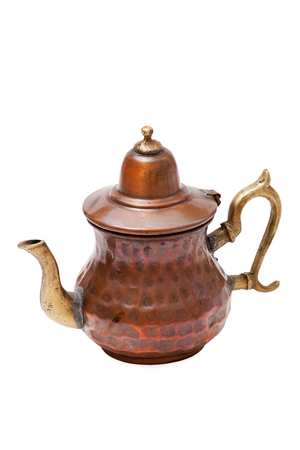 Old vintage arab copper tea pot isolated on white Backgroundの写真素材