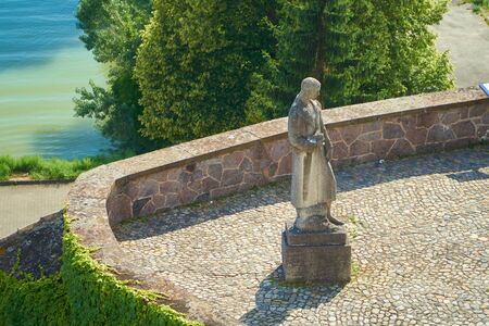 Memorial on a square in the town of Breisach with view on the rhinの写真素材